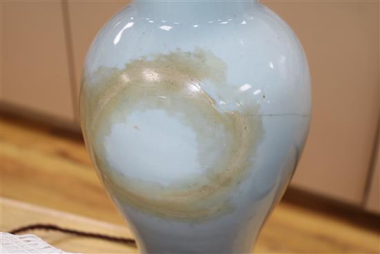 A pair of Chinese celadon glazed baluster table lamps height 73cm